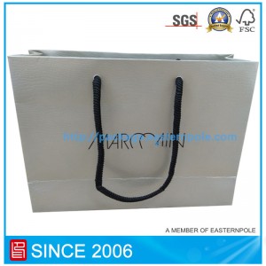 Mála páipéar snasta le haghaidh éadaí