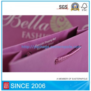 Mála páipéir corcra le láimhseáil snaidhmthe