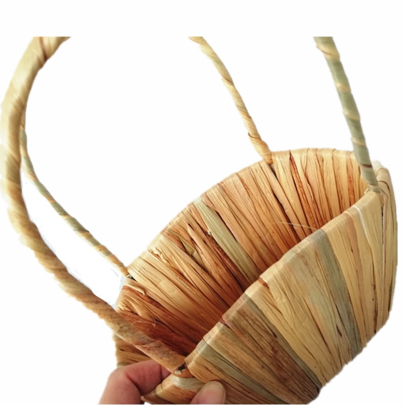 Ciseán Bláthanna Tuí le láimhseáil