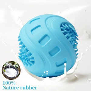 Madraí ag glanadh bréagáin liathróidí