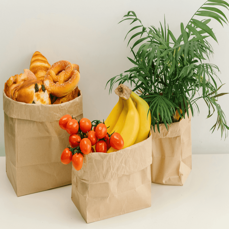 Conas a chuidíonn málaí páipéir saincheaptha le gnó a fheabhsú féiniúlacht bhrandan